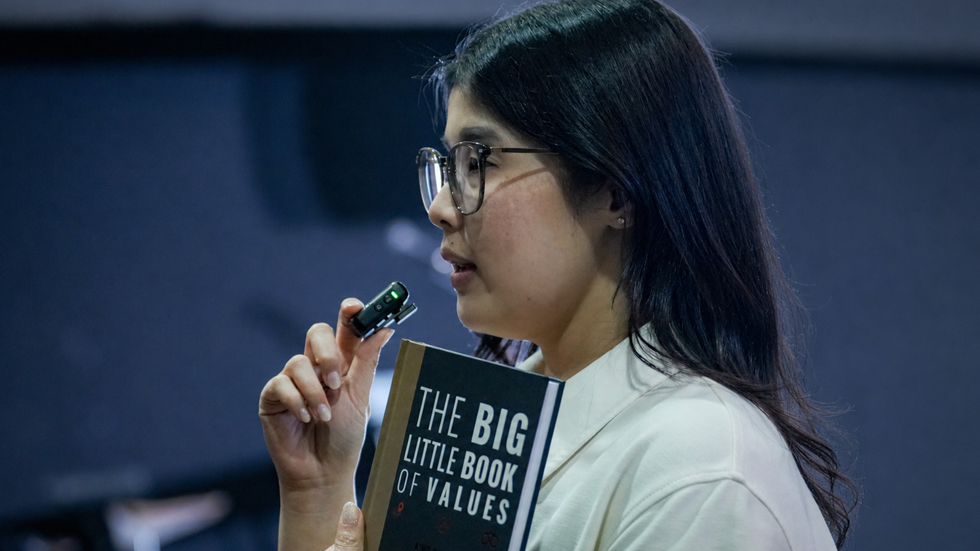 Workshop participant holding The Big Little Book of Values